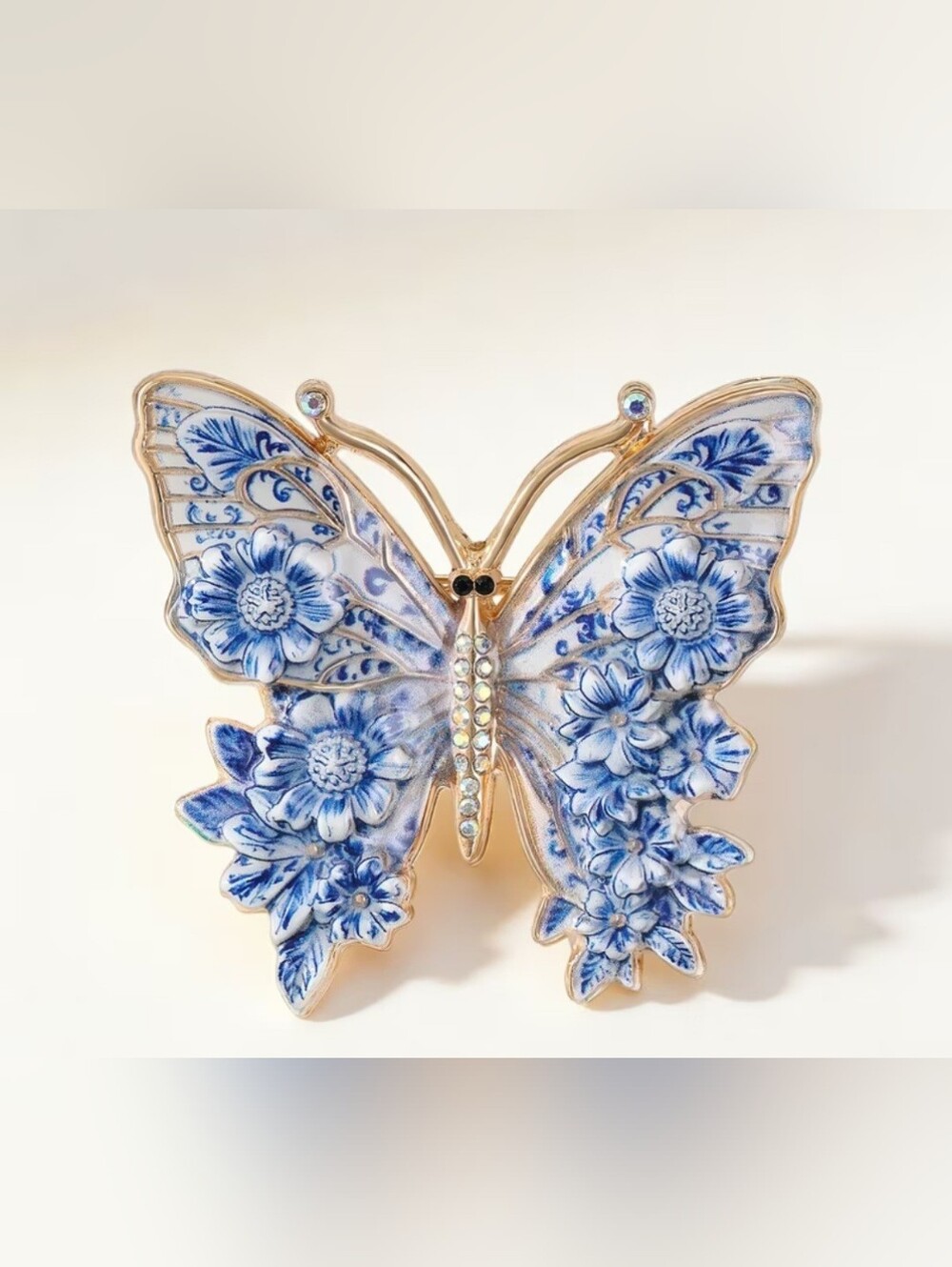 Gold-Tone Blue Floral Butterfly Brooch with Crystal Accents